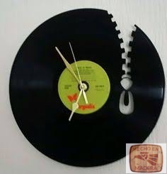 Reloj Disenos Disco con un cierre de ropa  0451