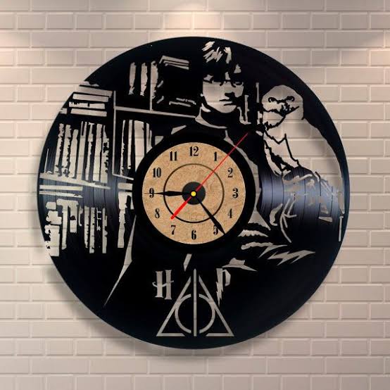Reloj Harry Potter Hedwig Biblioteca y Silueta 4039